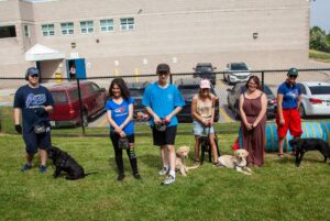 students with cope dogs